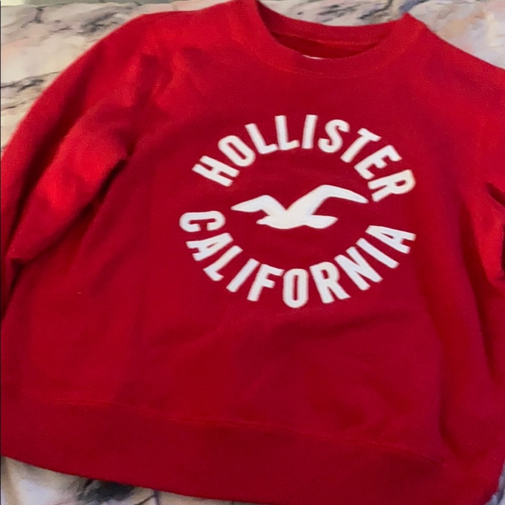 Red and white Hollister sweatshirt